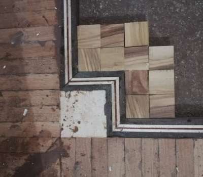 Parquet a disegno con essenze a intarsio